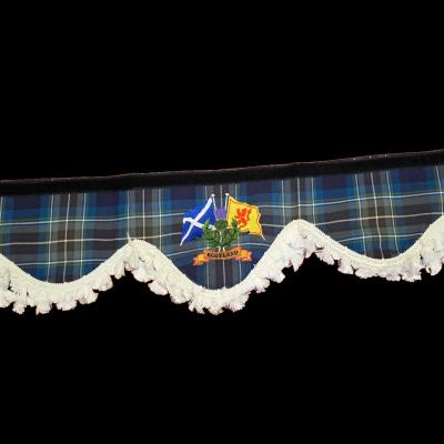 Enhance your cab interior with the Whiterig Holyrood tartan truck pelmet. Featuring embroidered crest and decorative white tassel trim. Whiterig Truck Curtains
