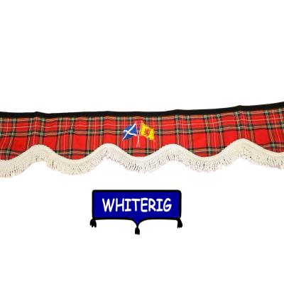 Enhance your cab interior with the Whiterig Royal Stewart tartan truck pelmet. Featuring a classic red tartan design with embroidered Scottish flags and decorative fringe trim. Whiterig Truck Curtains